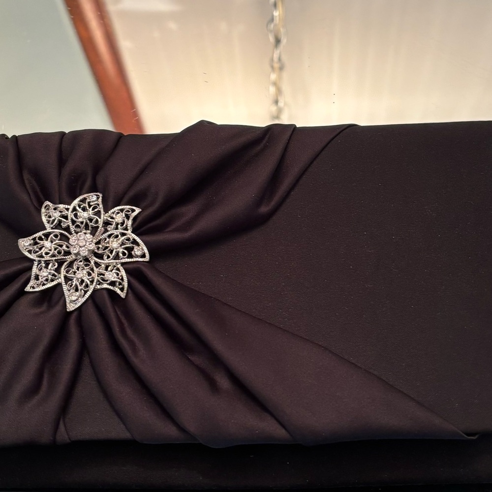 Elegant Black Clutch with Silver Floral Accent